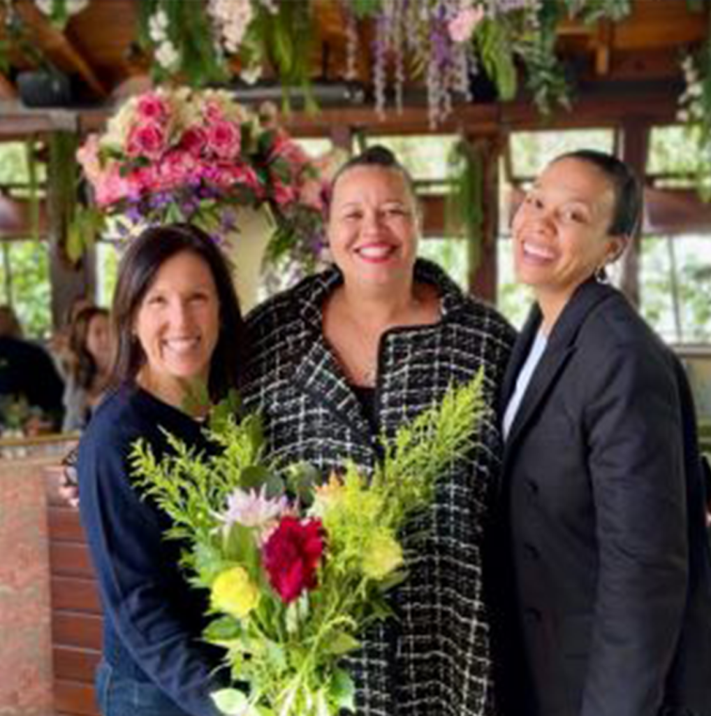 Dana C. Arnett with Jaymee Lomax, President and CEO of WBEC Pacific, and Tamara Keller of The Sax Agency at a women’s business leadership event