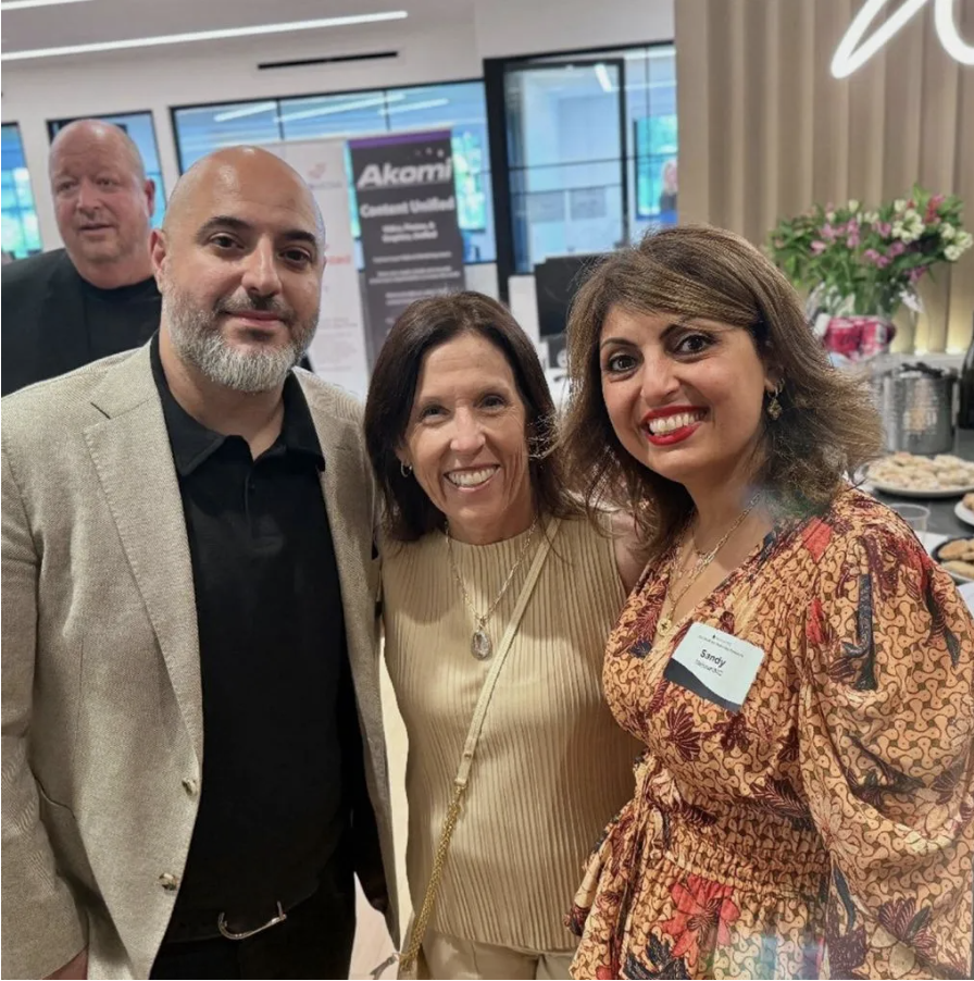 Dana C. Arnett with Sandy Nasseri, CEO of MelroseMAC, at technology and business networking event in Los Angeles